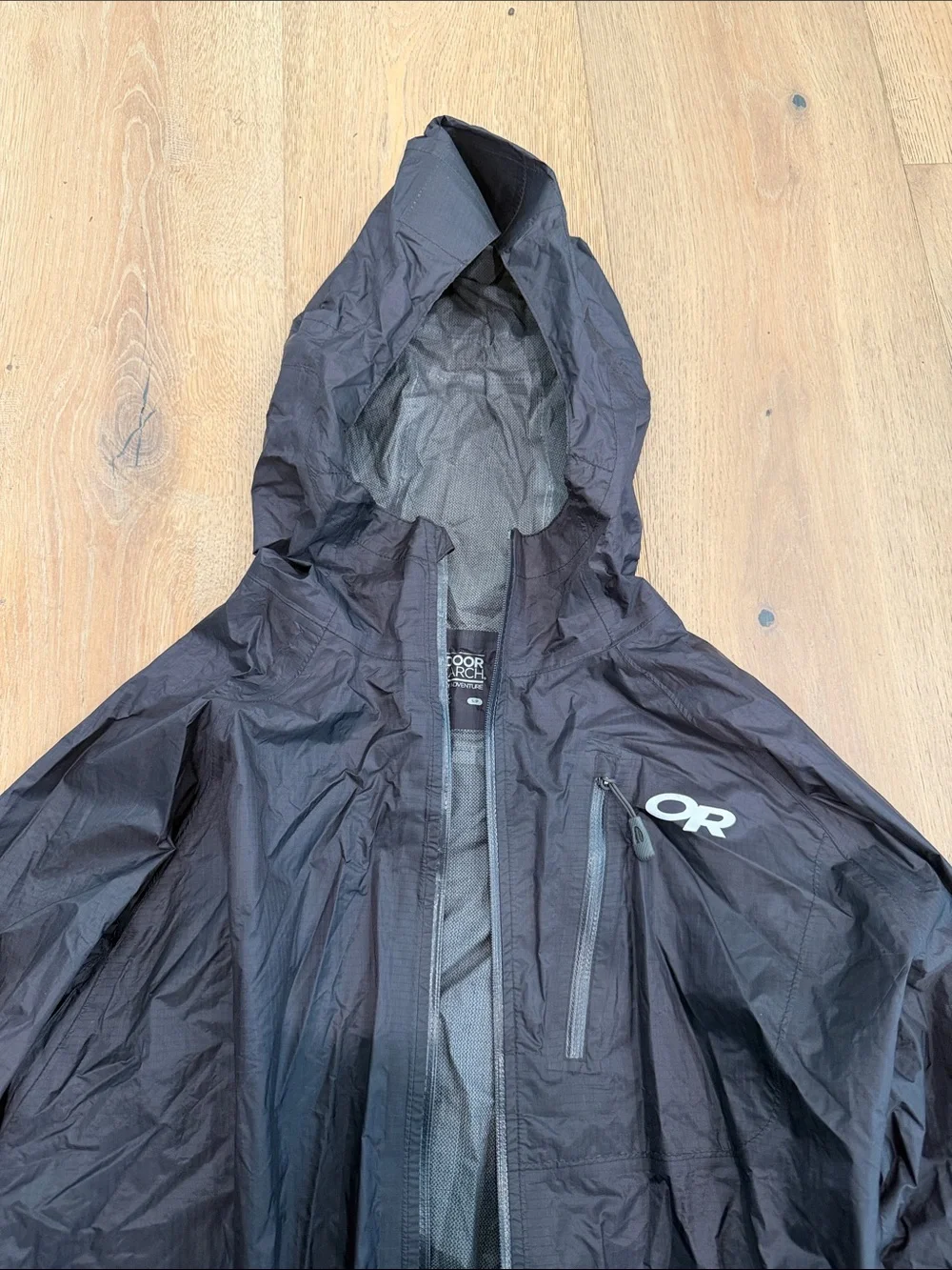 Outdoor Research Black Hooded Packable Rain Shell. Rain jacket. Size small